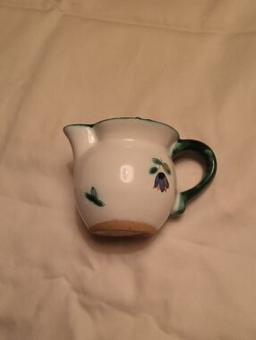 Gmundner Scattered Blossoms Creamer with Green Handle and Floral Accent